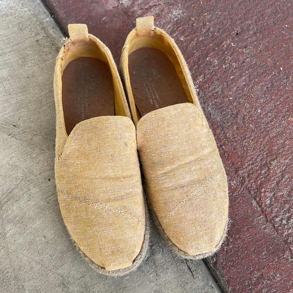 Toms Espadrilles Yellow Slip on. Size 6.5. Lightly Worn.